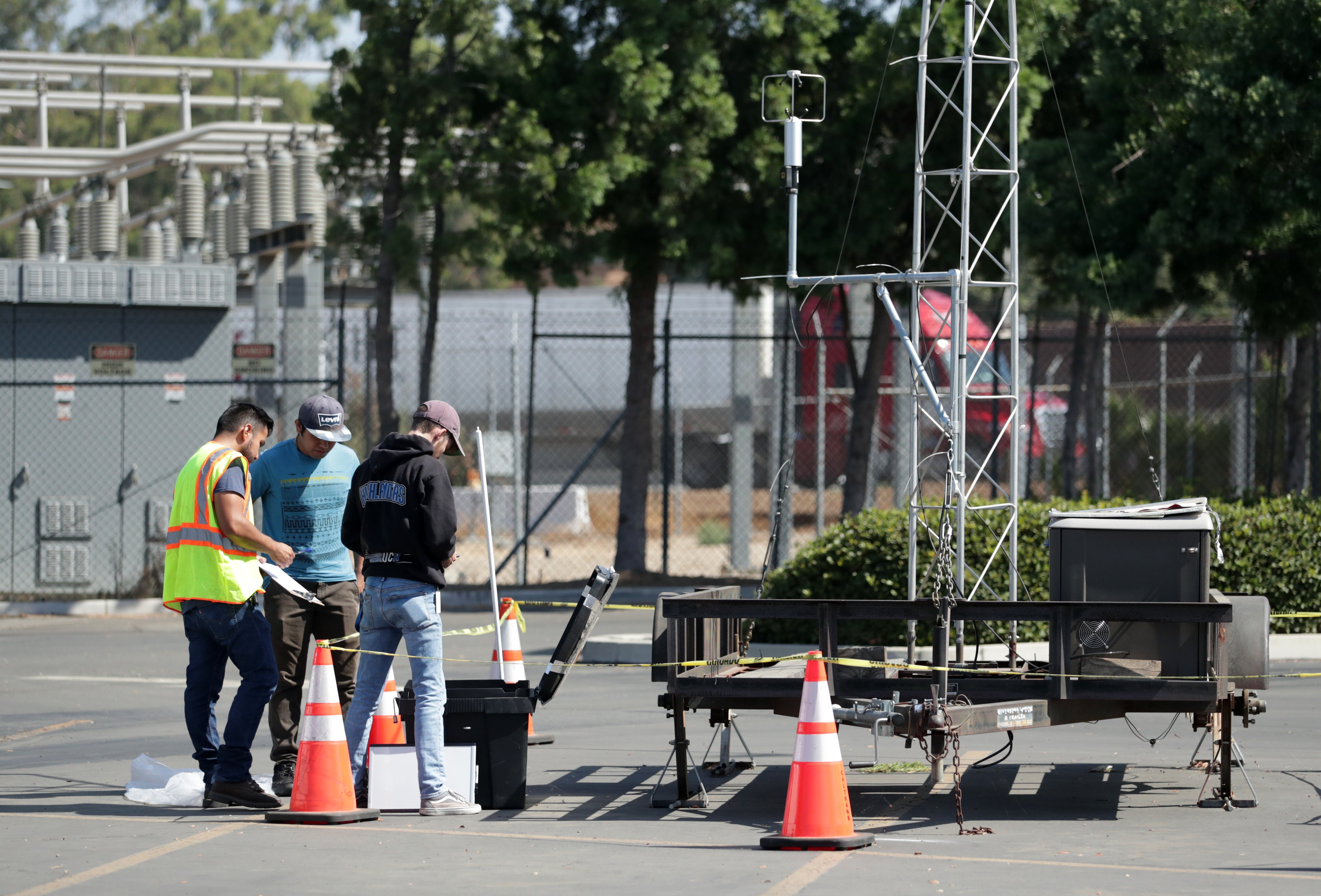 What’s with the boxes and towers in the campus parking lots? Inside